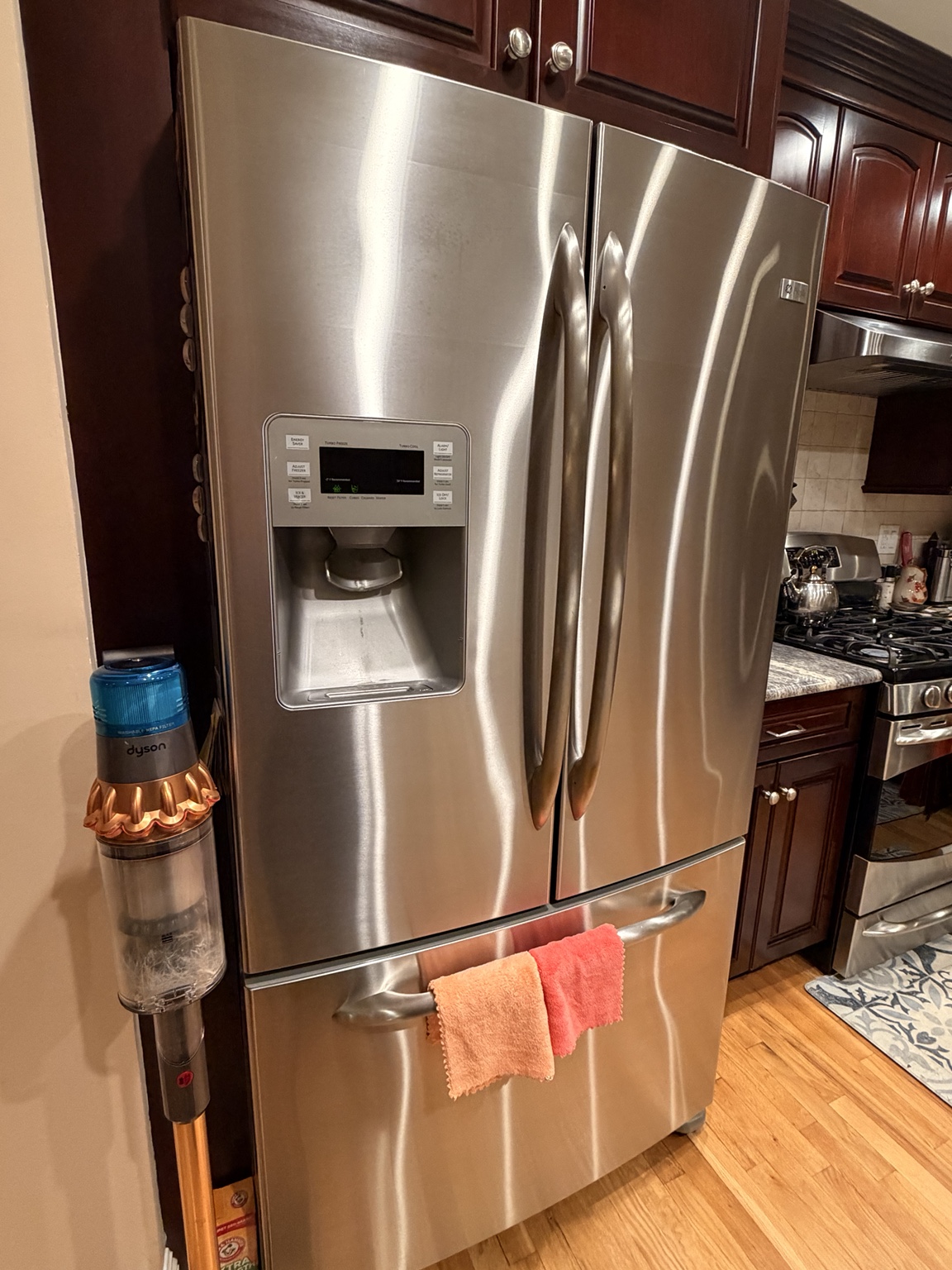 Clean stainless steel refrigerator doors and handles